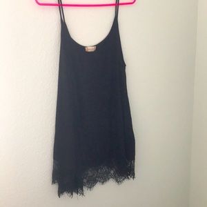 Black camisole with lace fringe